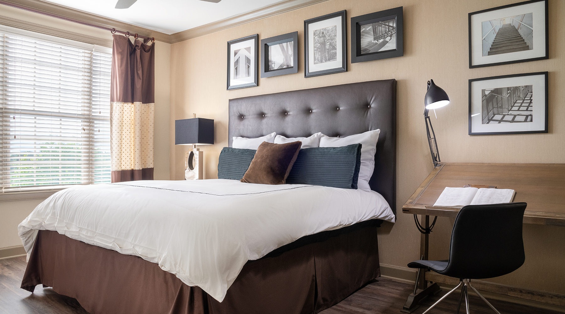 bedroom with large bed chair and table