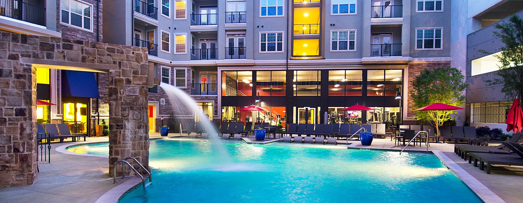 Pool at dusk at Emory Point Apartments