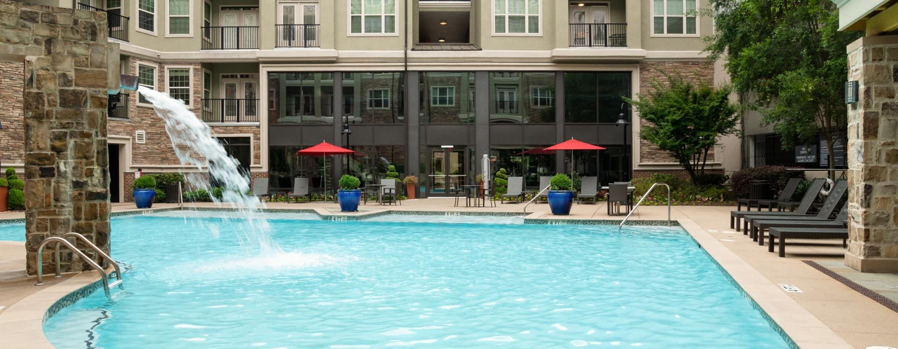 a pool with a fountain in it