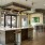 a kitchen with a bar and stools