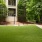 a large green lawn in front of a building