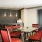 a room with a table and chairs